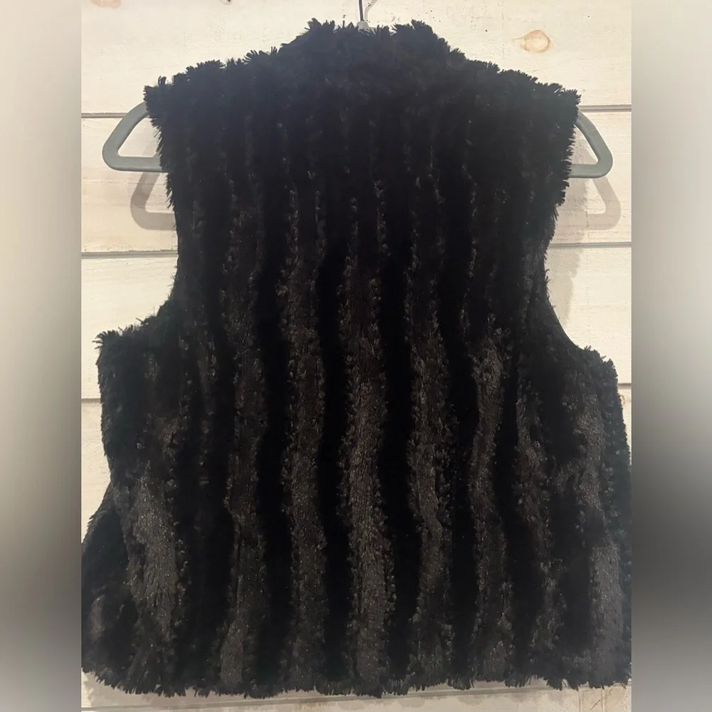 Aqua Bloomingdales  Black Faux Fur Vest size small. Zip up with pockets